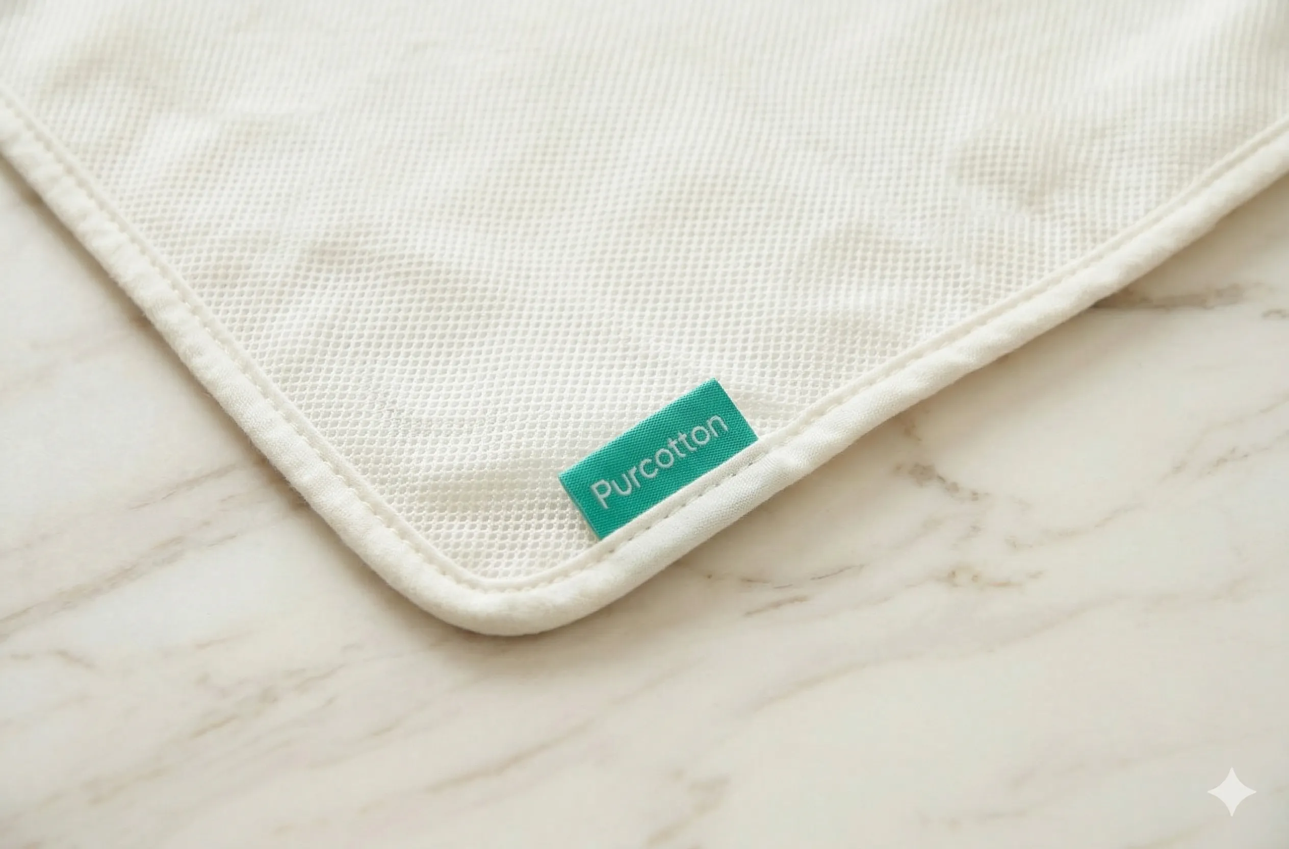 Close-up of pouch label stitching