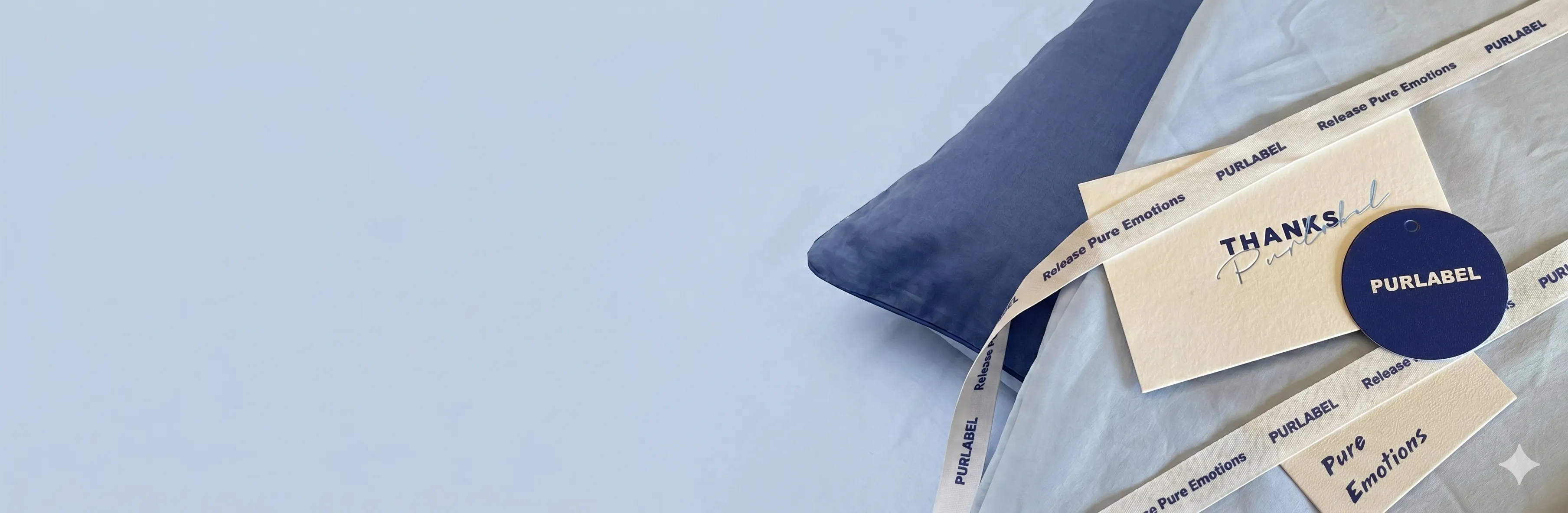 Home textile packaging and labels in soft blue fabric