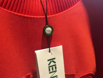 Custom hang tag attached to apparel